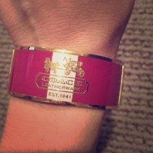 Coach bangle pink and gold with trademark logo